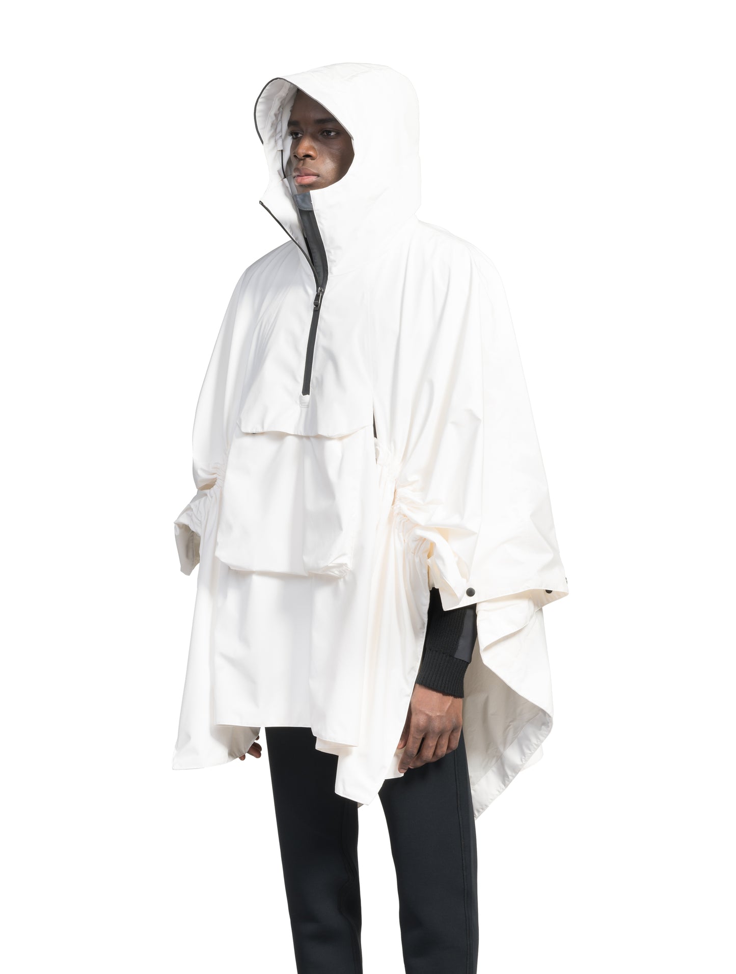 Hydra Unisex Performance Poncho in thigh length, non-removable hood, vertical half-zipper along centre front collar, hidden side-entry waist zipper pockets, adjustable webbing straps and snap closure cuffs, and packable to front kangaroo pocket with flap opening, in Chalk