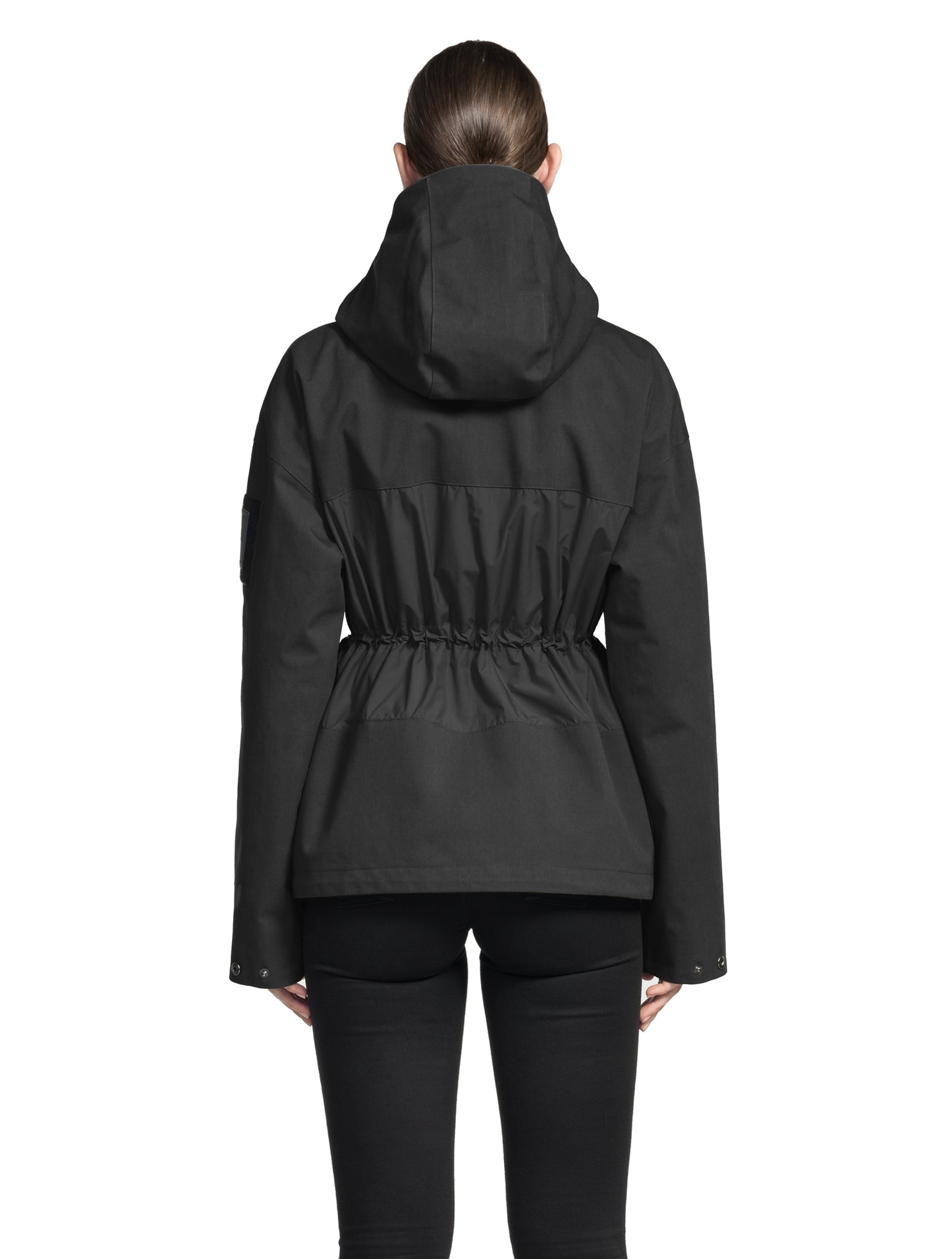 Opal Women's Performance Short Shell Jacket in hip length, premium cotton blend and contrast iridescent fabrication, adjustable drawcord at waist, non-removable hood with reflective trim, adjustable hood draw cord at interior collar, zippered side entry pockets at waist, top entry flap pockets at waist, adjustable snap cuffs, snap button wind flap, two-way branded zipper at centre front, and interior zipper pocket, in Black