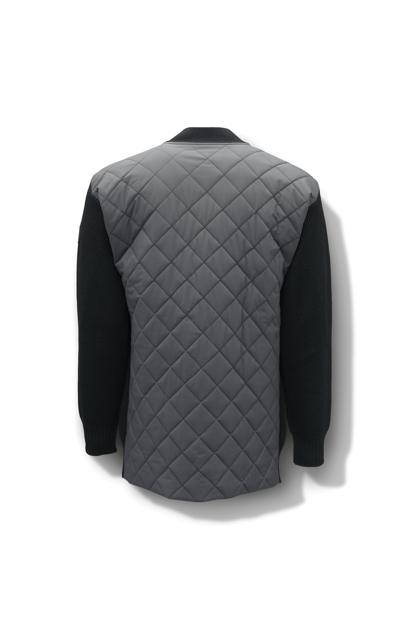 Riga Tailored Button Front Cardigan in thigh length, premium virgin extra fine merino wool knit and stretch ripstop fabrication, Primaloft Gold Insulation Active+, button-front closure, quilted back detailing, front waist pockets, in Black