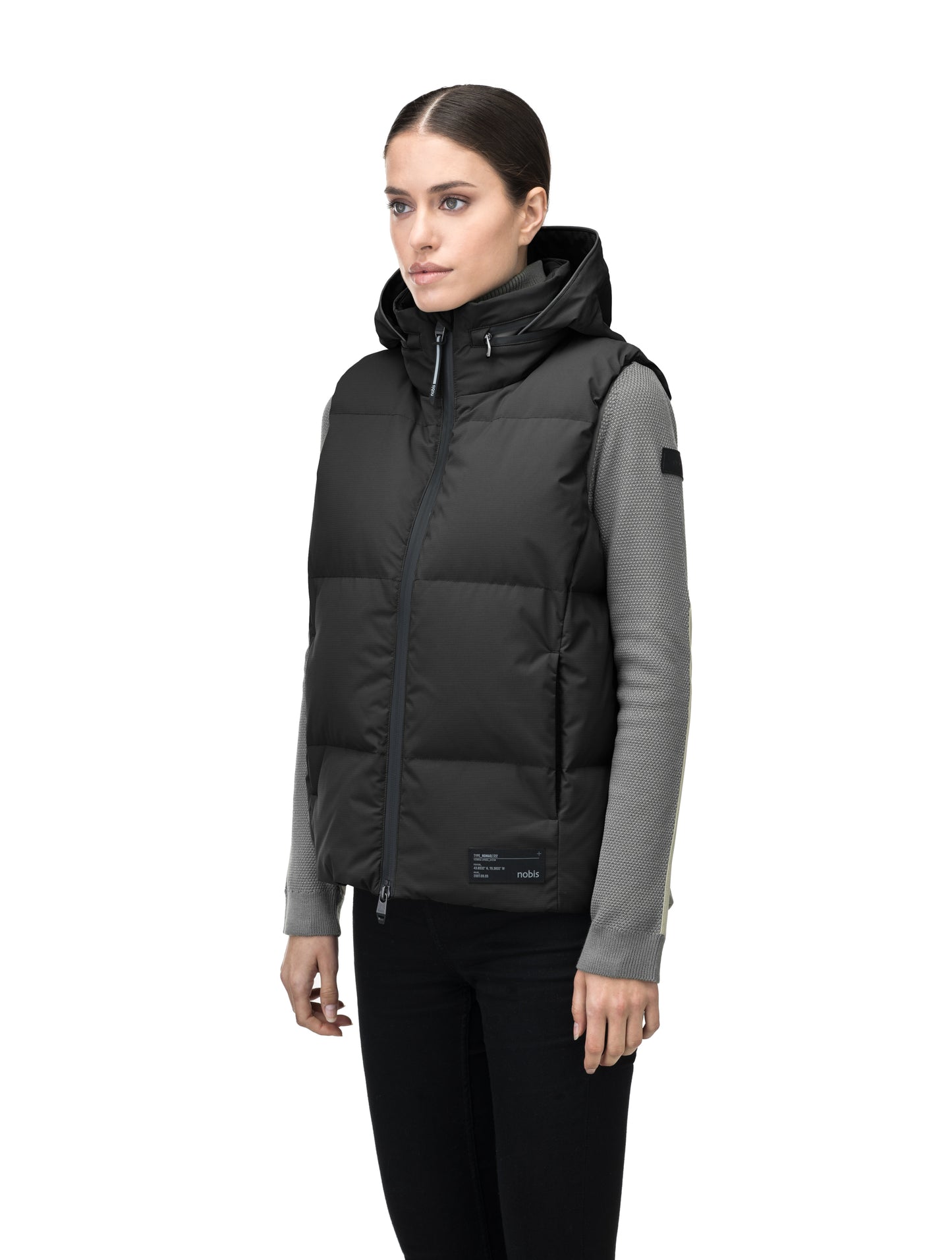 Oren Ladies Performance Vest in hip length, Durable Stretch Ripstop and 3-Ply Micro Denier fabrication, Premium Canadian White Duck Down insulation, tuck-away waterproof hood, and two-way centre front zipper, in Black