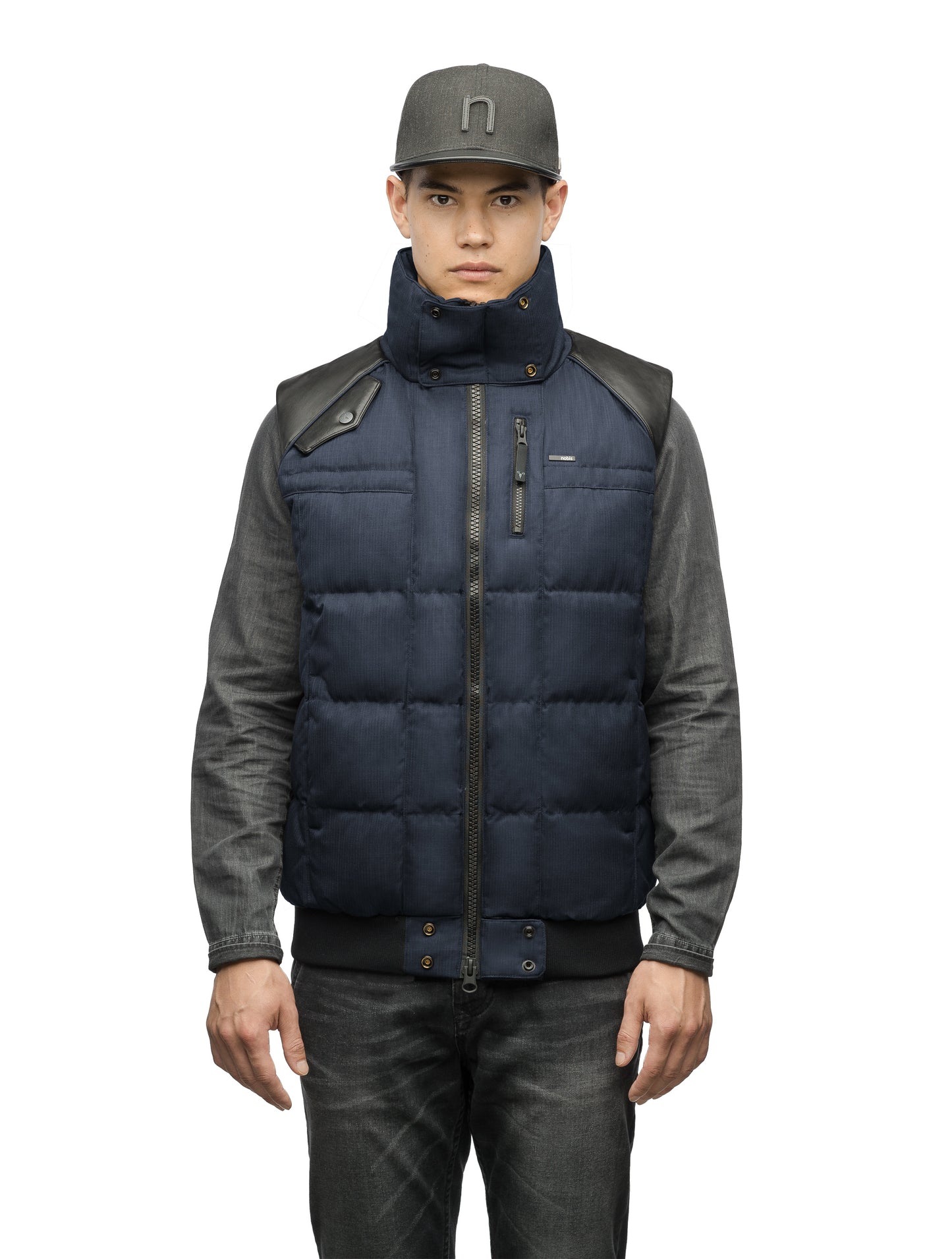 Men's down filled vest with Washable Japanese DWR leather acccent in CH Navy