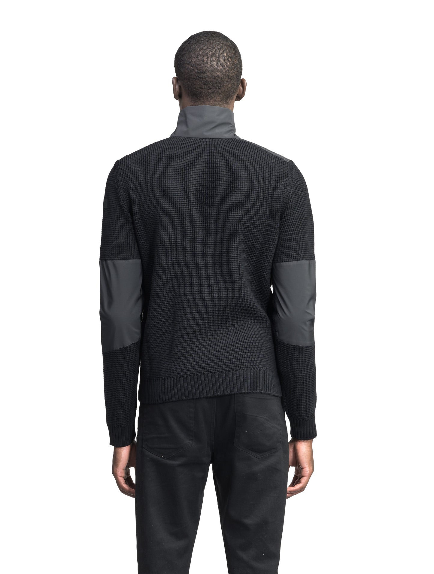 Wai Men's Performance Half Zip Sweater in hip length, 3-Ply Micro Denier and Merino wool knit fabrication, Primaloft Gold Insulation Active+, centre front zipper, flap kangaroo pocket with magnetic closure, and hidden side-entry zipper pockets at waist, in Black