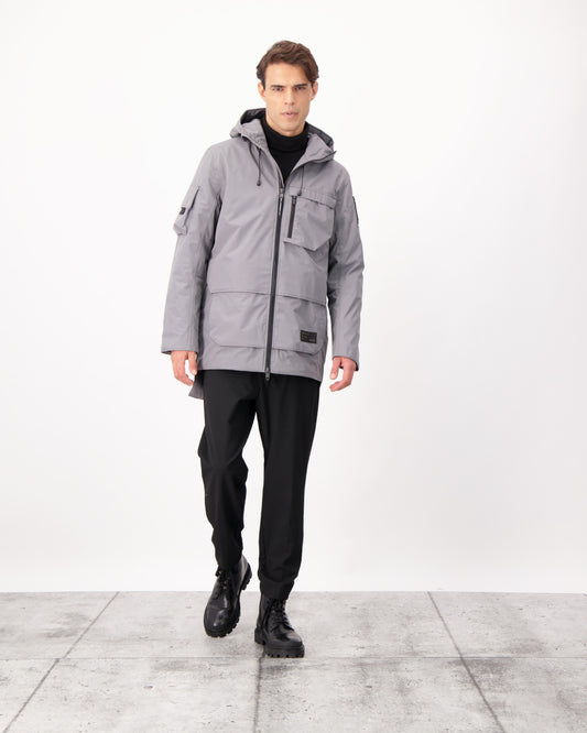 Alta Men's Performance Shell Jacket in hip length, Primaloft Gold Insulation Active+, chest and waist pockets, ventilation under arms, reflective detailing on hood and back, two-way front zipper, and non-removable hood with adjustable drawstrings, in Concrete