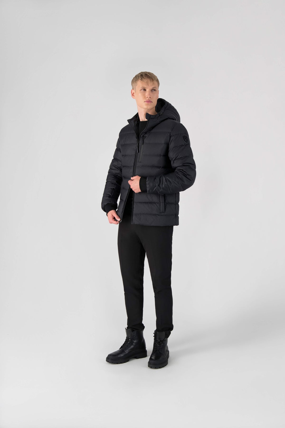 Chris Men's Mid Weight Reversible Puffer Jacket in hip length, Canadian duck down insulation, non-removable adjustable hood, ribbed cuffs, and quilted body on reversible side, in Black