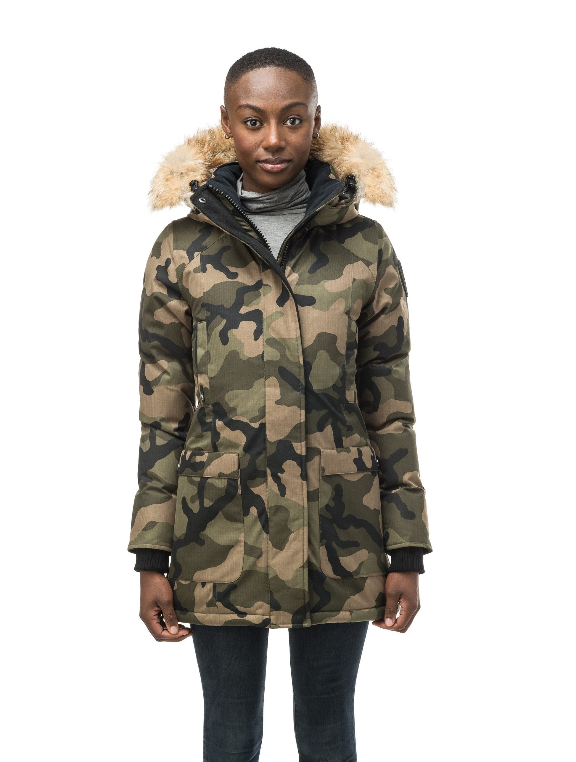Women's down filled parka that sits just below the hip with a clean look and two hip patch pockets in CH Camo