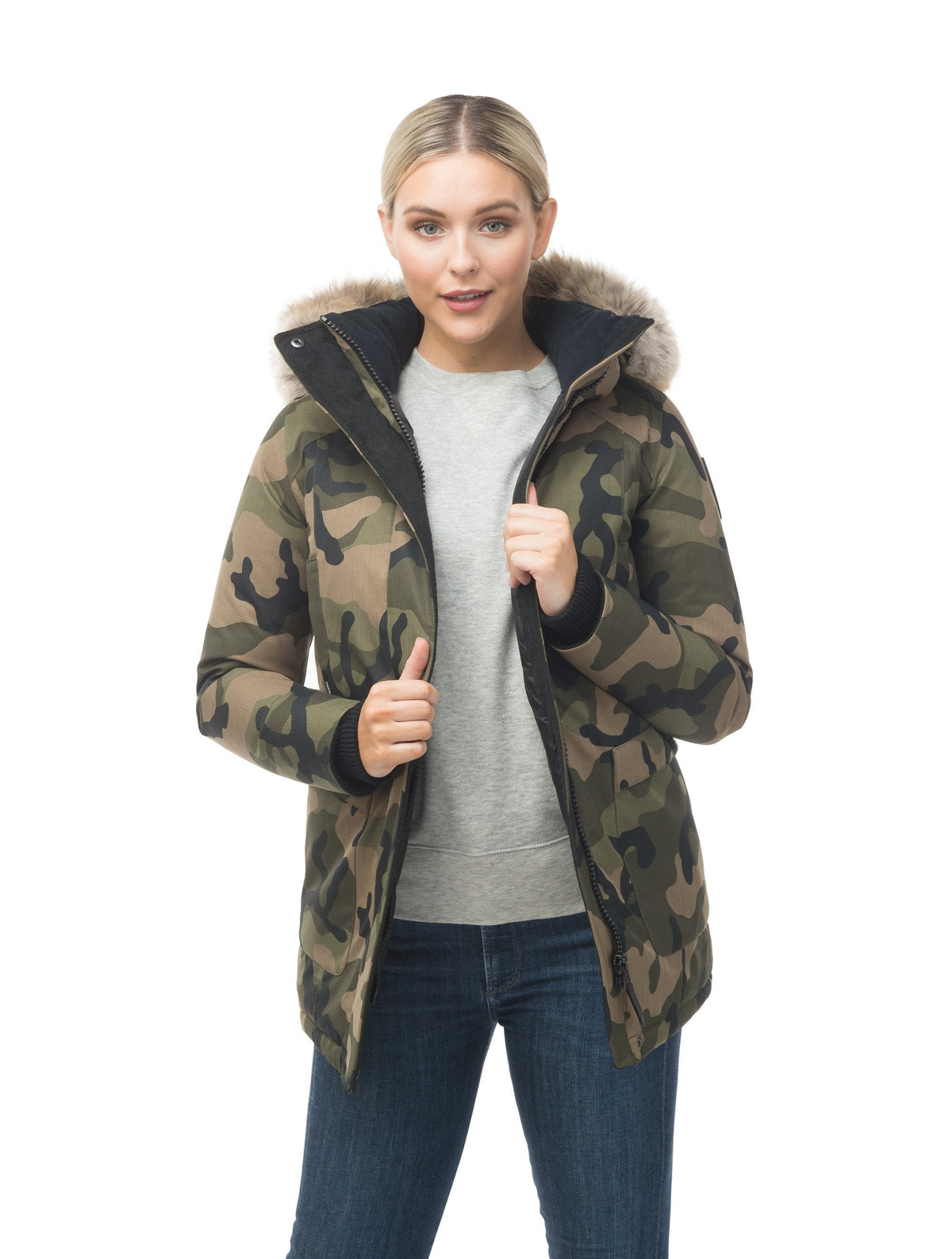 Women's down filled parka that sits just below the hip with a clean look and two hip patch pockets in Camo