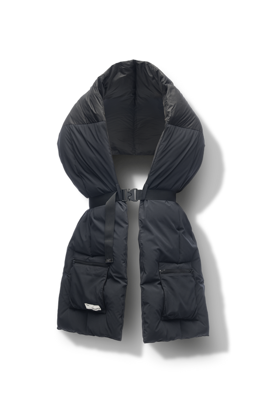 Chroma Unisex Oversized Puffer Scarf in stretch ripstop and taffeta nylon in a quilted pattern, Canadian White Duck Down insulation, cobra buckle belt with webbing strap, and large zipper pocket at scarf end, in Black + Black