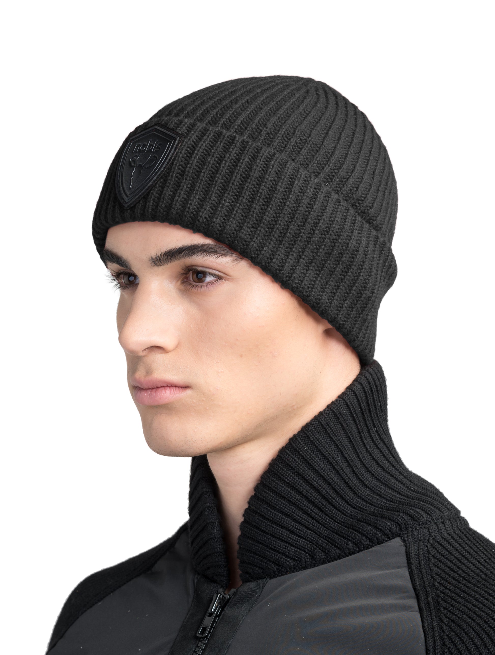 Emer Unisex Tailored Chunky Knit Beanie in extra fine merino wool blend, and black leather Nobis shield logo on cuff, in Black