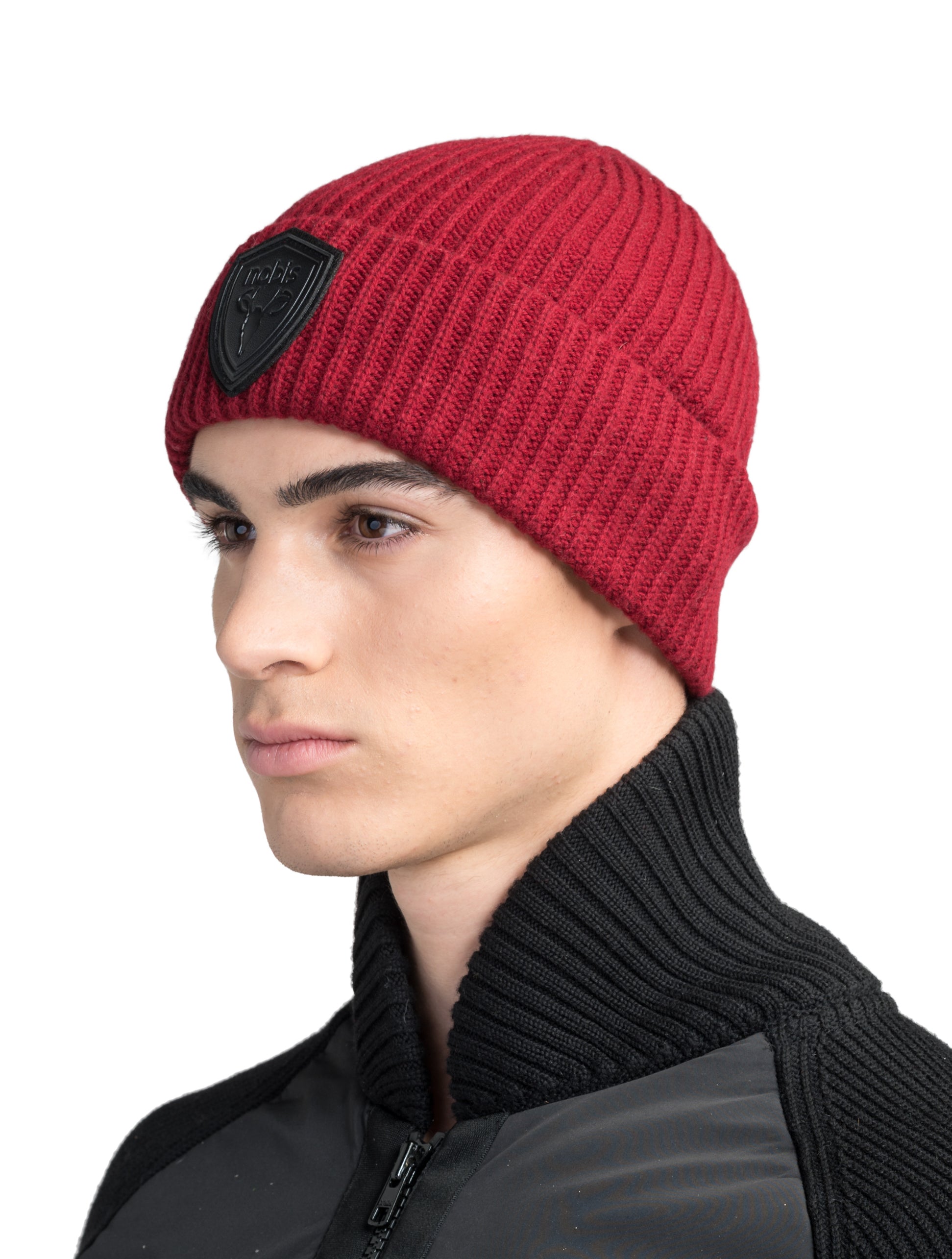 Emer Unisex Tailored Chunky Knit Beanie in extra fine merino wool blend, and black leather Nobis shield logo on cuff, in Rio Red