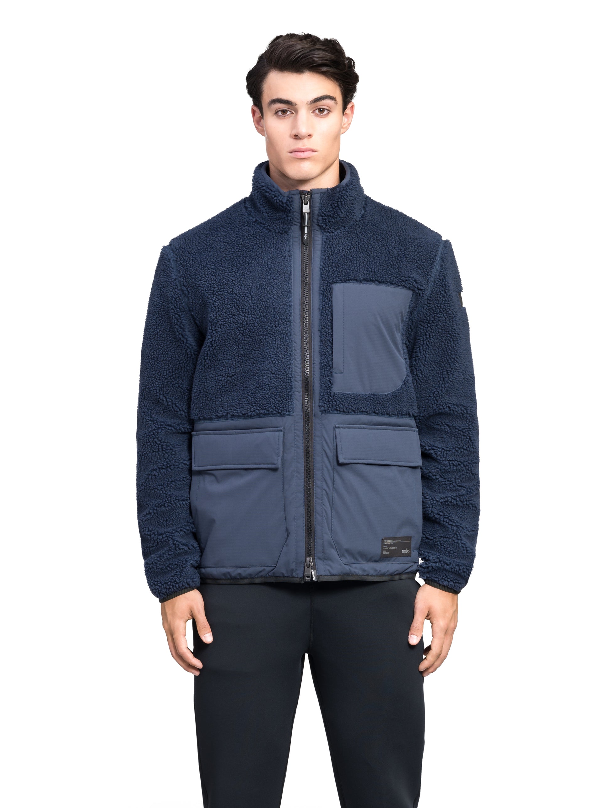 Kepler Men's Berber Zip Front Sweater in hip length, premium berber and stretch ripstop fabrication, Primaloft Gold Insulation Active+, two-way centre-front zipper, zipper pocket at left chest, magnetic closure flap pockets at waist with additional side-entry pockets, in Marine