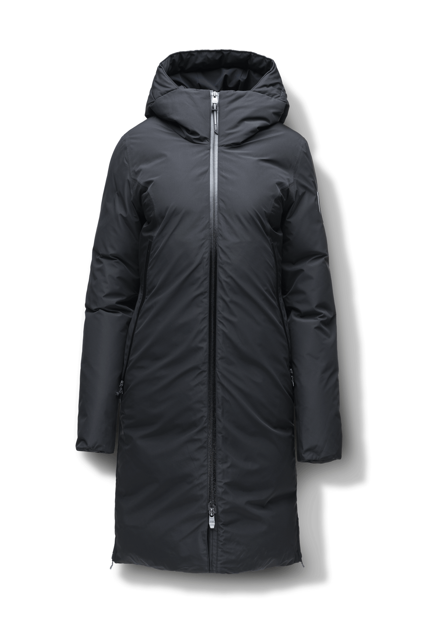 Inara Women's Performance Parka in knee length, premium 3-ply micro denier and stretch ripstop fabrication with DWR coating, Premium Canadian White Duck Down insulation, non-removable down-filled hood, centre front two-way zipper, large vertical zipper pockets along waist, zipper vents along bottom side hem, in Black