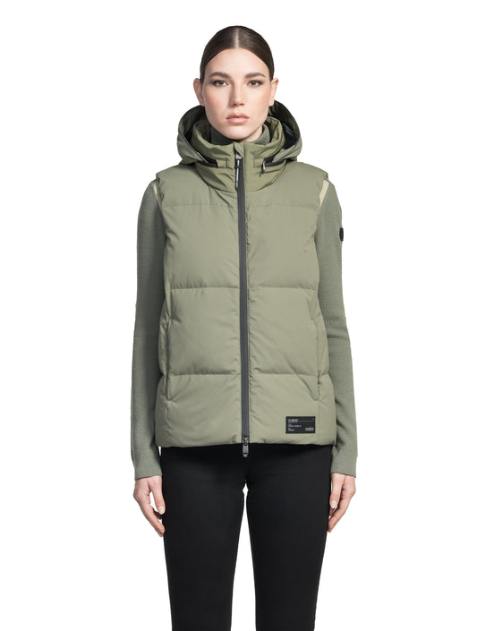 Oren Ladies Performance Vest in hip length, Durable Stretch Ripstop and 3-Ply Micro Denier fabrication, Premium Canadian White Duck Down insulation, tuck-away waterproof hood, and two-way centre front zipper, in Clover
