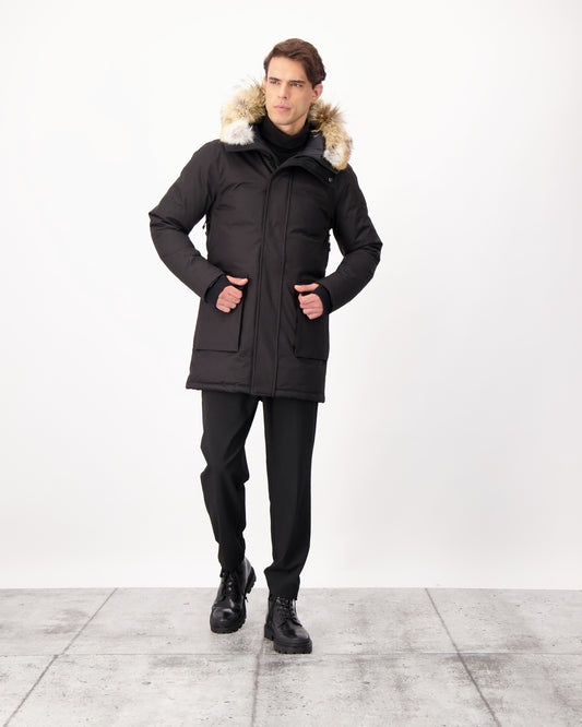 Men's slim fitting waist length parka with removable fur trim on the hood and two waist patch pockets in CH Black
