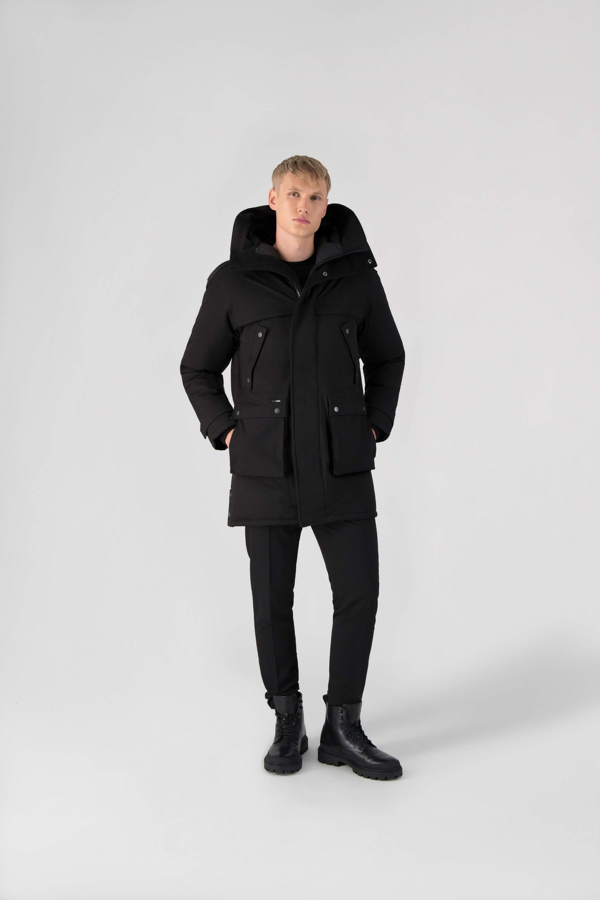 Men's Best Selling Parka the Yatesy is a down filled jacket with a zipper closure and magnetic placket in Black