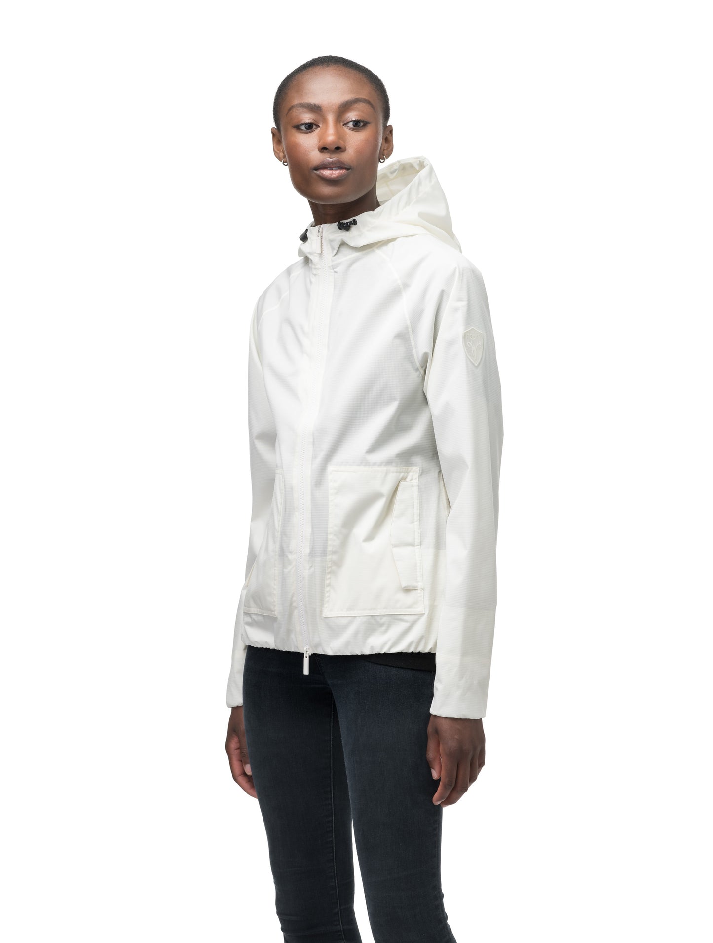 Women's hip length waterproof jacket with non-removable hood and two-way zipper in Chalk