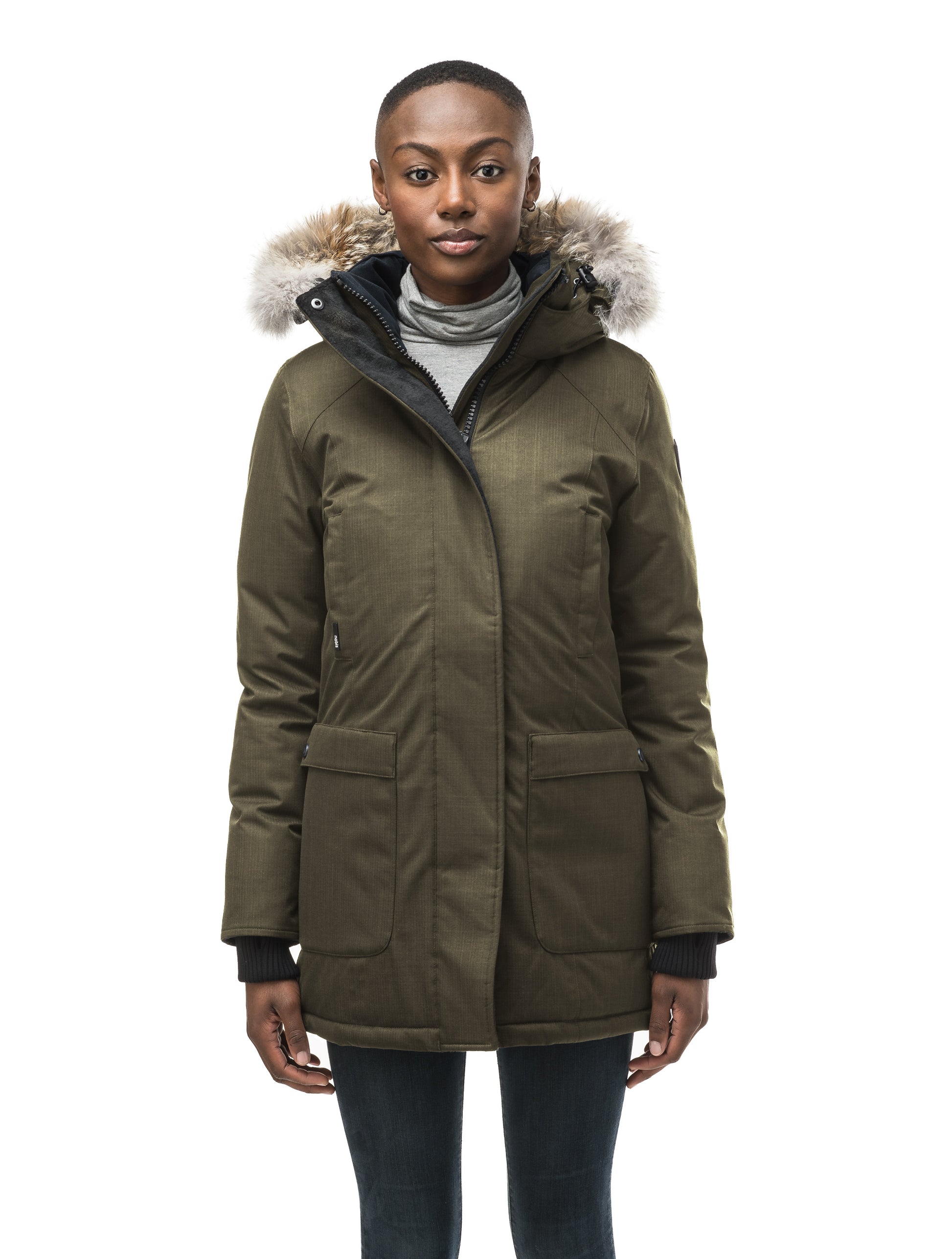 Women's down filled parka that sits just below the hip with a clean look and two hip patch pockets in CH Army Green
