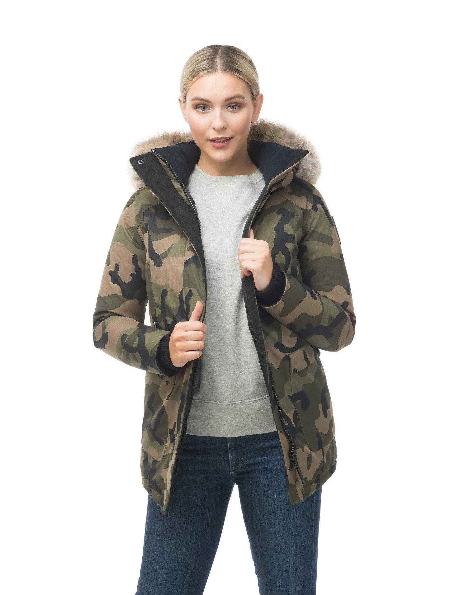 Women's down filled parka that sits just below the hip with a clean look and two hip patch pockets in CH Camo