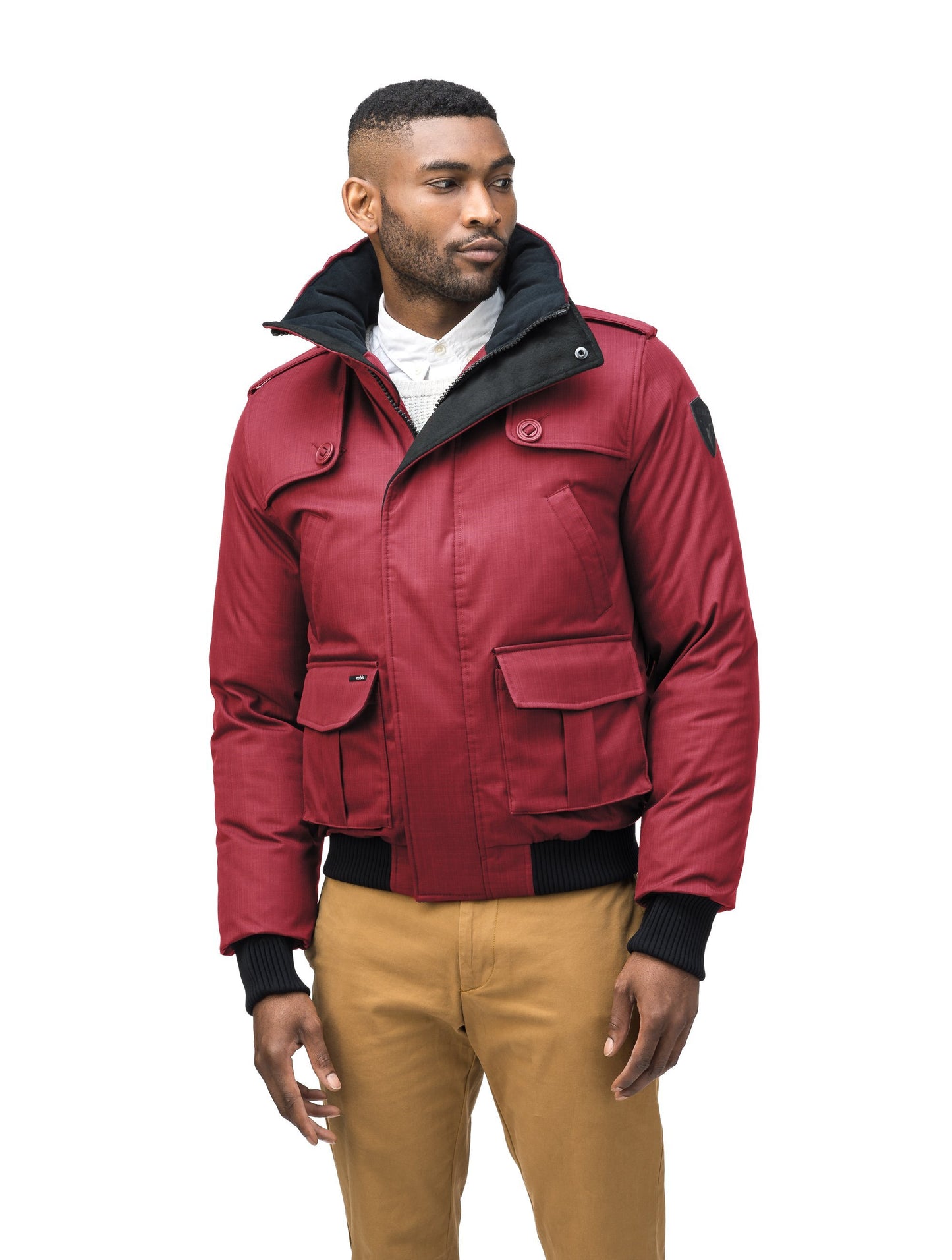 Men's down filled bomber that sits just above the hips with a completely removable hood that's windproof, waterproof, and breathable in CH Cabernet