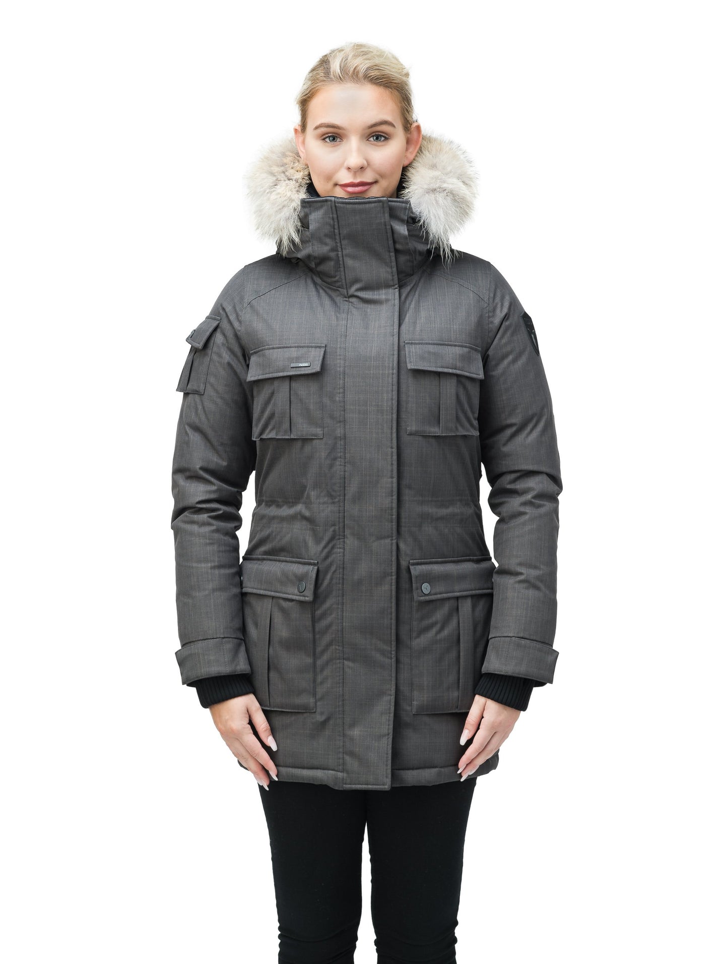 Women's down filled thigh length parka with four pleated patch pockets and an adjustable waist in CH Steel Grey