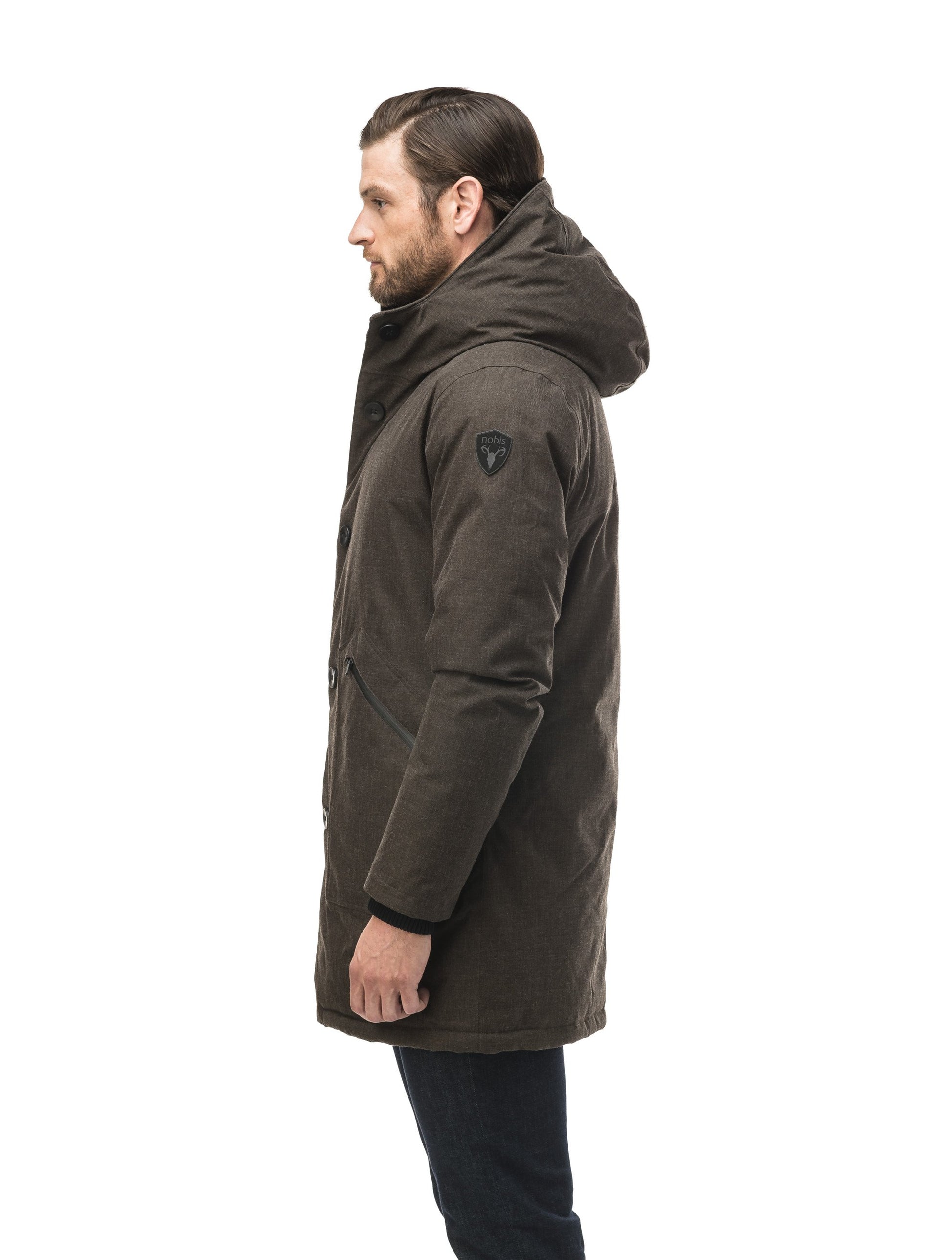 Men's fur free hooded parka with zipper and button closure placket featuring two oversized front pockets in H. Brown