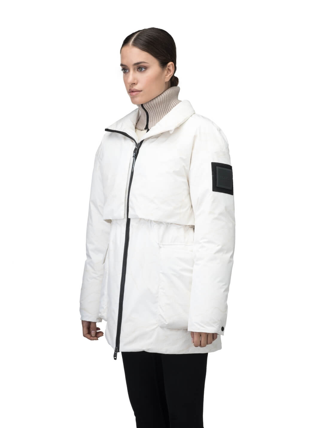 Haelyn Ladies Short Utility Parka in thigh length, 3-Ply Micro Denier fabrication, Premium Canadian White Duck Down insulation, removable down-filled hood, two-way centre front zipper, hidden adjustable cord at waist, adjustable snap cuffs, and four exterior patch pockets at front, in Wheat Desert