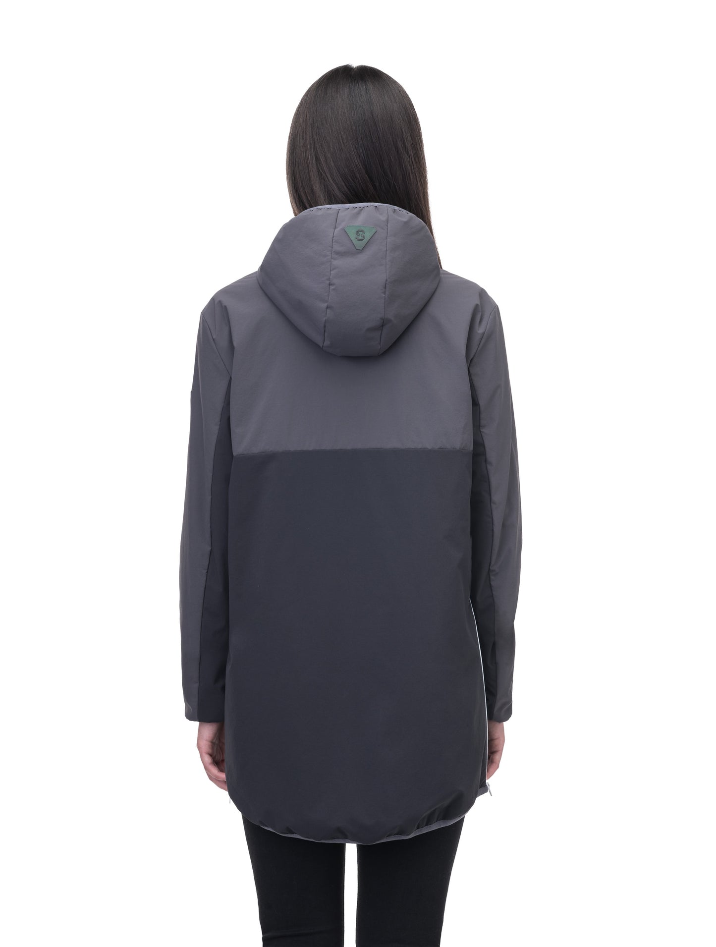 Unisex thigh length hooded anorak with vertical zipper along collar, side zippers along torso, and centre zipper pouch with a reflective flap, in Steel Grey/Black