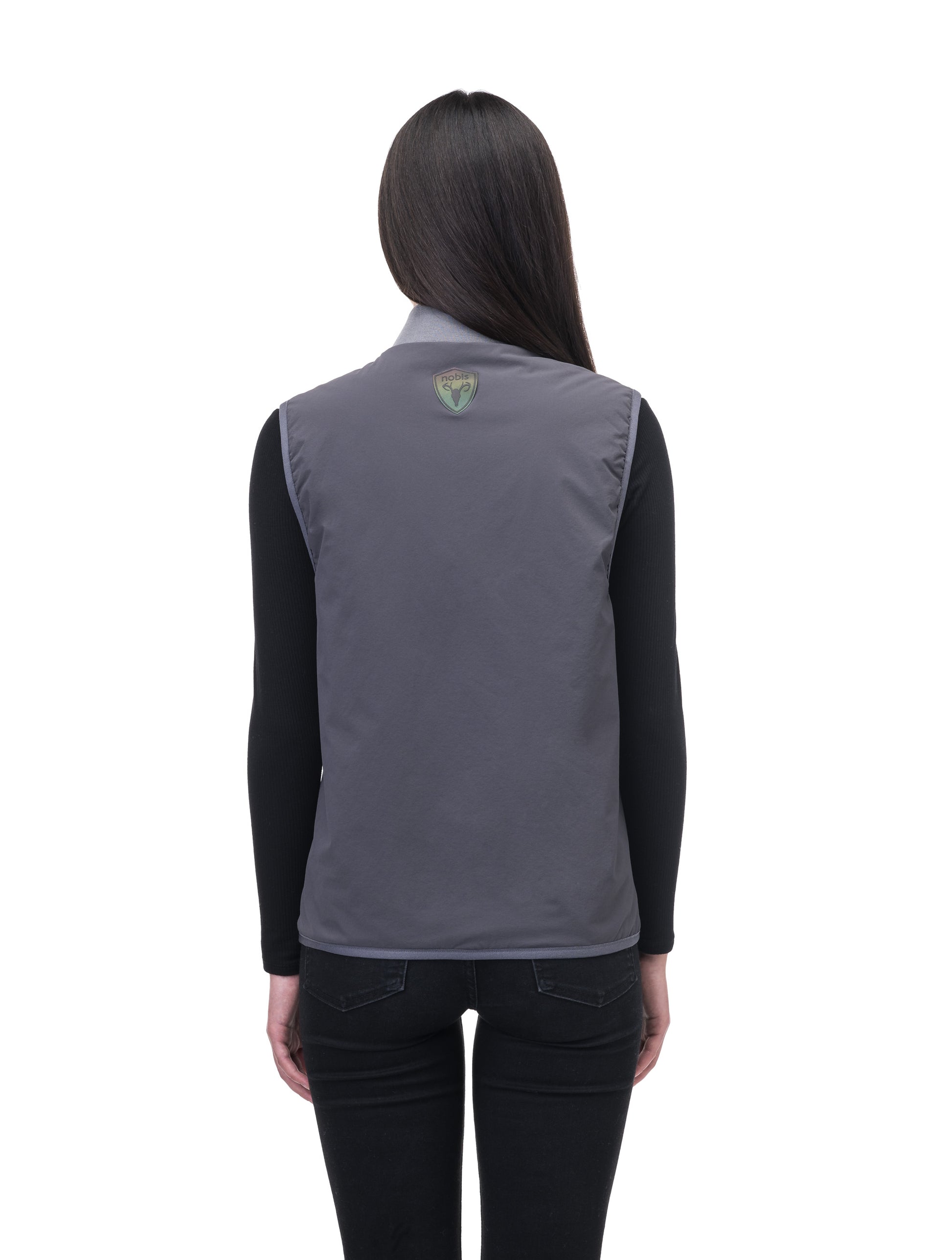 Unisex hip length vest with a contrast colour back panel, and hidden zipper pockets at waist, and an invisible zipper pocket at chest, in Concrete/Steel Grey