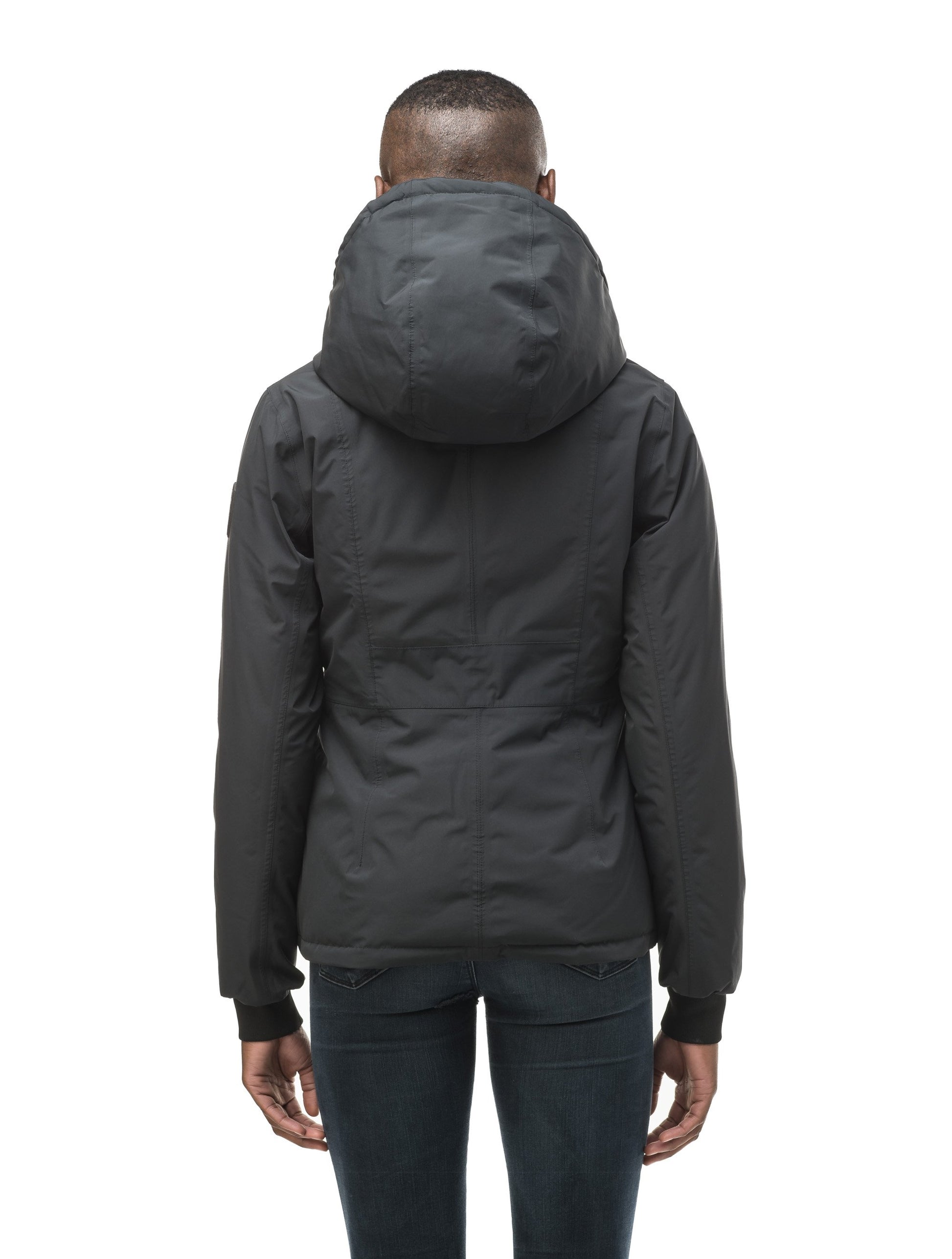 A women's two in one reversible hip length down jacket, one side is quilted and one side is solid waterproof fabric in Black