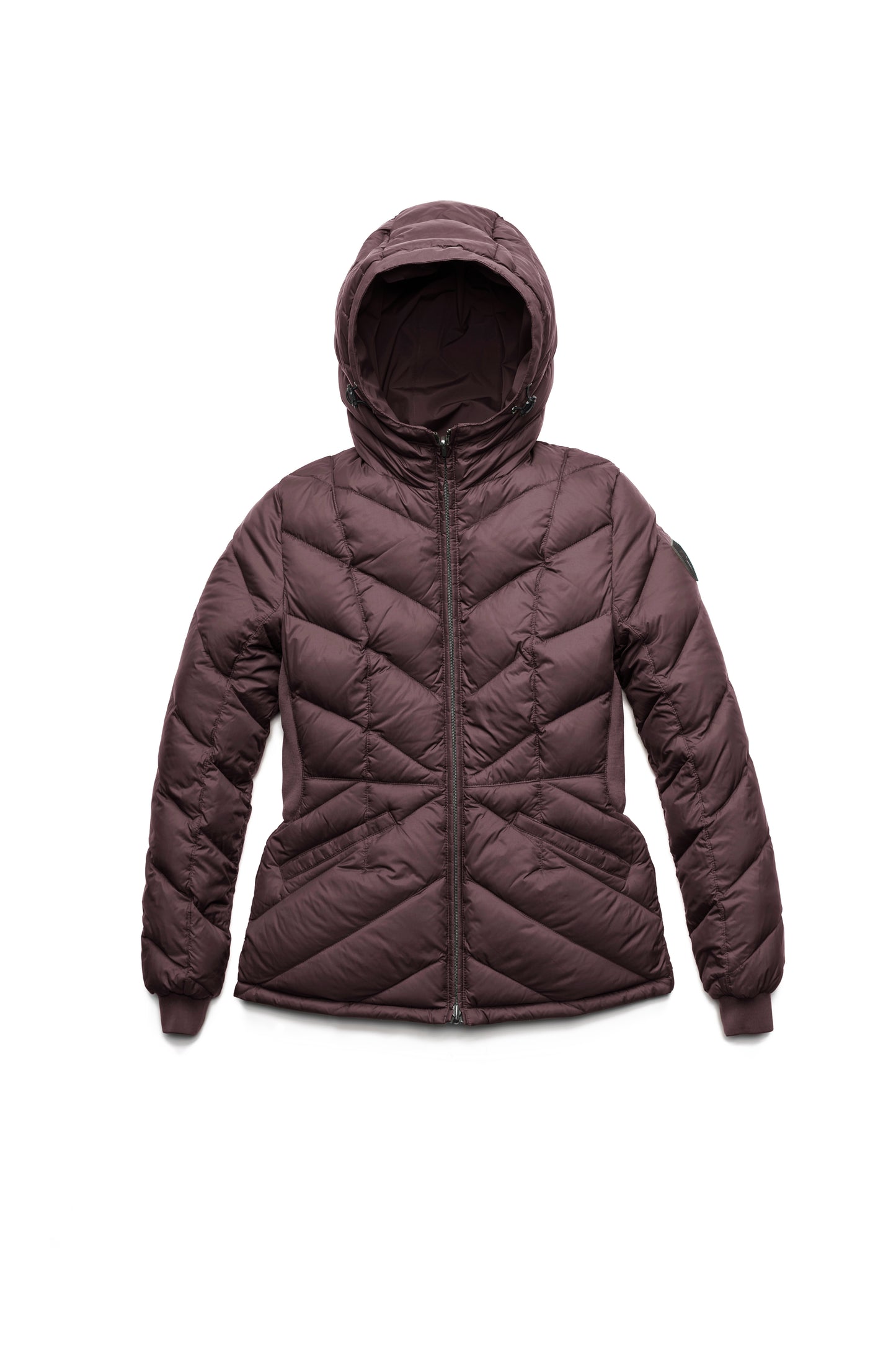 A women's two in one reversible hip length down jacket, one side is quilted and one side is solid waterproof fabric in Burgundy