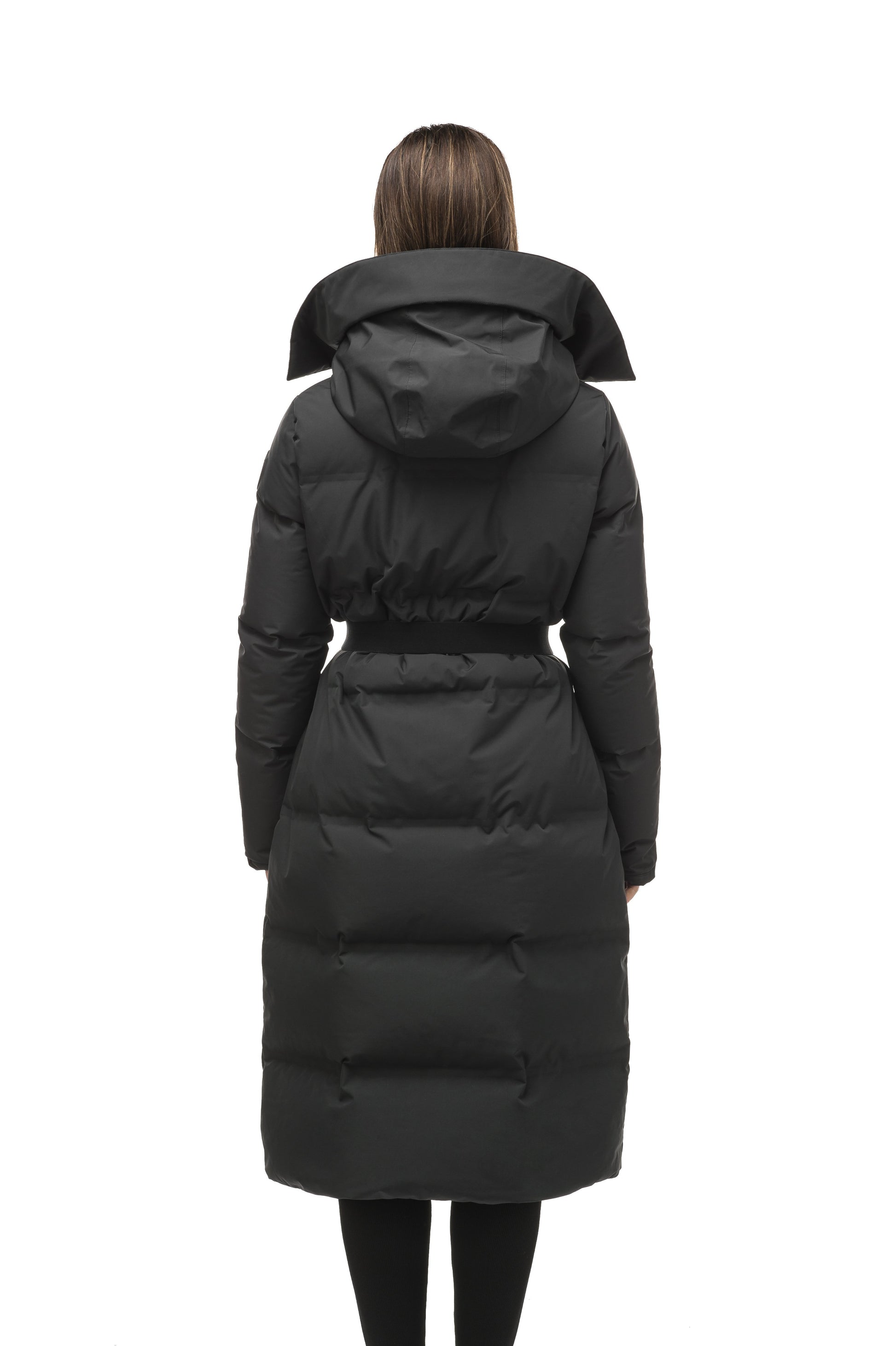 Women's ankle length puffer jacket with a minimalist modern design,ÃƒÆ’Ã†â€™Ãƒâ€ Ã¢â‚¬â„¢ÃƒÆ’Ã¢â‚¬Â ÃƒÂ¢Ã¢â€šÂ¬Ã¢â€žÂ¢ÃƒÆ’Ã†â€™Ãƒâ€šÃ‚Â¢ÃƒÆ’Ã‚Â¢ÃƒÂ¢Ã¢â€šÂ¬Ã…Â¡Ãƒâ€šÃ‚Â¬ÃƒÆ’Ã¢â‚¬Â¦Ãƒâ€šÃ‚Â¡ÃƒÆ’Ã†â€™Ãƒâ€ Ã¢â‚¬â„¢ÃƒÆ’Ã‚Â¢ÃƒÂ¢Ã¢â‚¬Å¡Ã‚Â¬Ãƒâ€¦Ã‚Â¡ÃƒÆ’Ã†â€™ÃƒÂ¢Ã¢â€šÂ¬Ã…Â¡ÃƒÆ’Ã¢â‚¬Å¡Ãƒâ€šÃ‚Â featuring an exposed zipper, and seamless puffer channels in Black