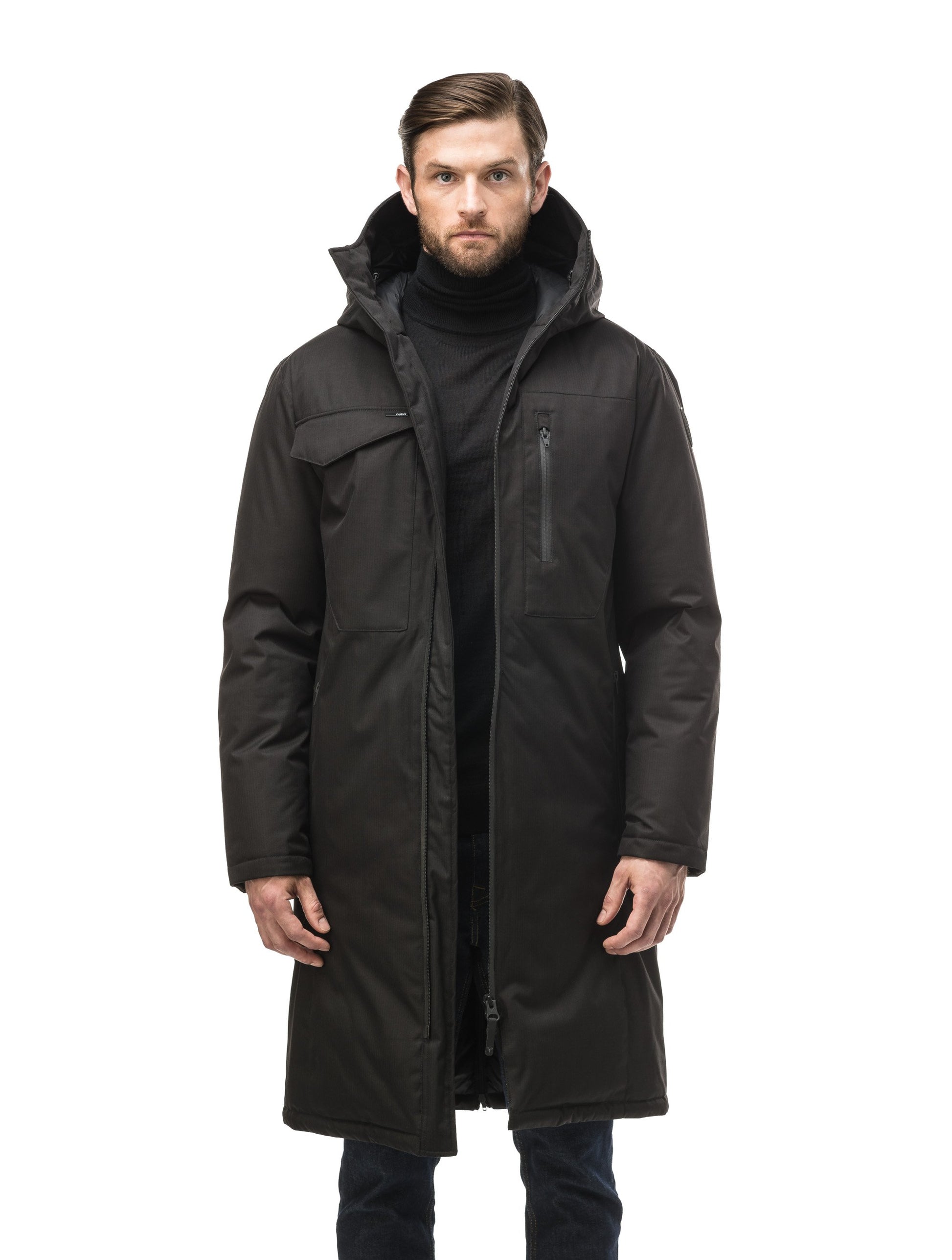 Long men's calf length parka with down fill and exposed zipper that features spacious pockets and zippered vents in Black