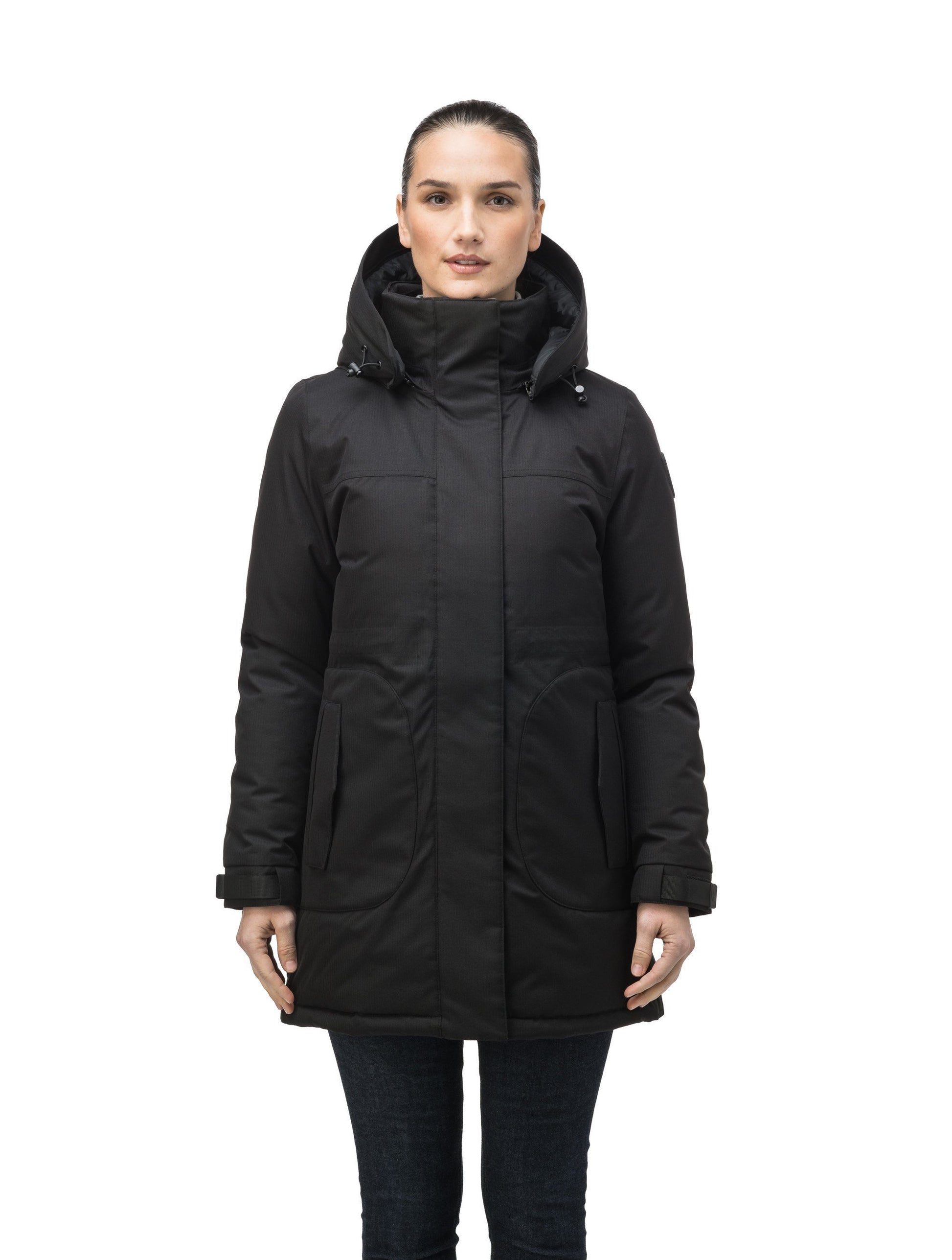 Thigh length women's down filled parka with side entry pockets and drawcord waist, removable hood and fur trim in Black