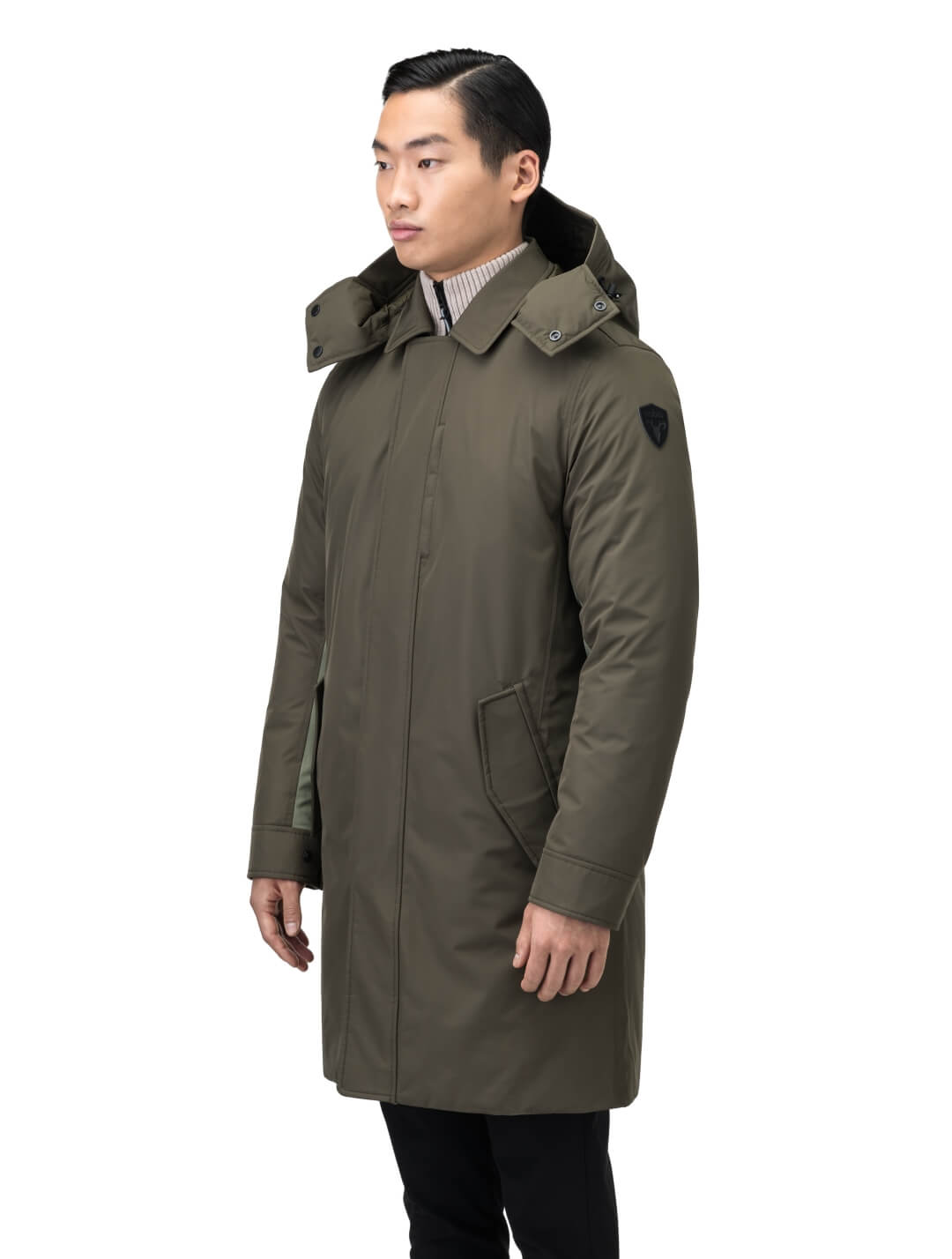 Nord Men's Tailored Trench Coat in knee length, 3-Ply Micro Denier and 4-Way Durable Stretch Weave fabrication, Premium Canadian White Duck Down insulation, removable down-filled hood, exterior zipper pocket at left chest, and adjustable snap button cuffs, in Fatigue/Eden
