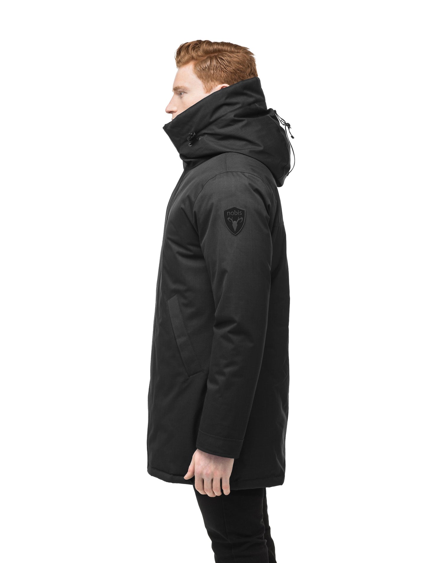 Pierre Men's Jacket in thigh length, Canadian white duck down insulation, non-removable down-filled hood, angled waist pockets, centre-front zipper with wind flap, and elastic ribbed cuffs, in CH Black