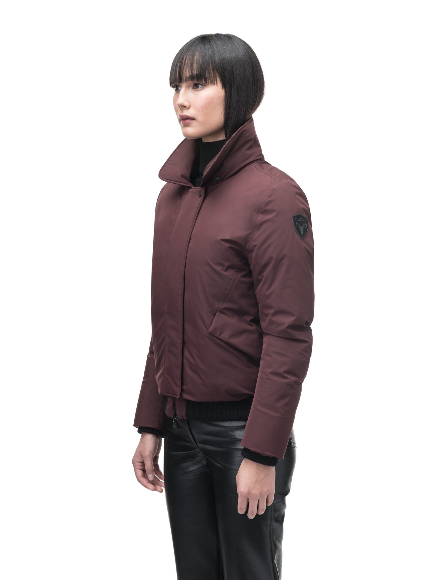Rae Ladies Aviator Jacket in hip length, Canadian duck down insulation, removable shearling collar with hidden tuckable hood, and two-way front zipper, in Merlot