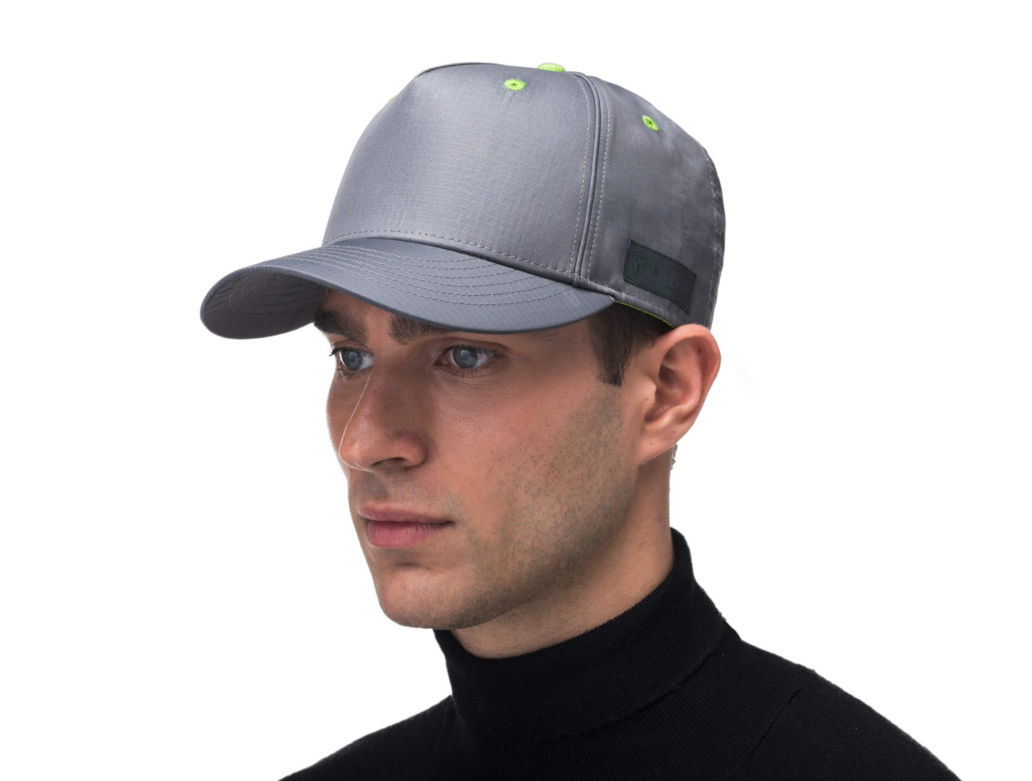 Unisex 5 panel baseball cap with adjustable back and contrast colour detailing in Concrete
