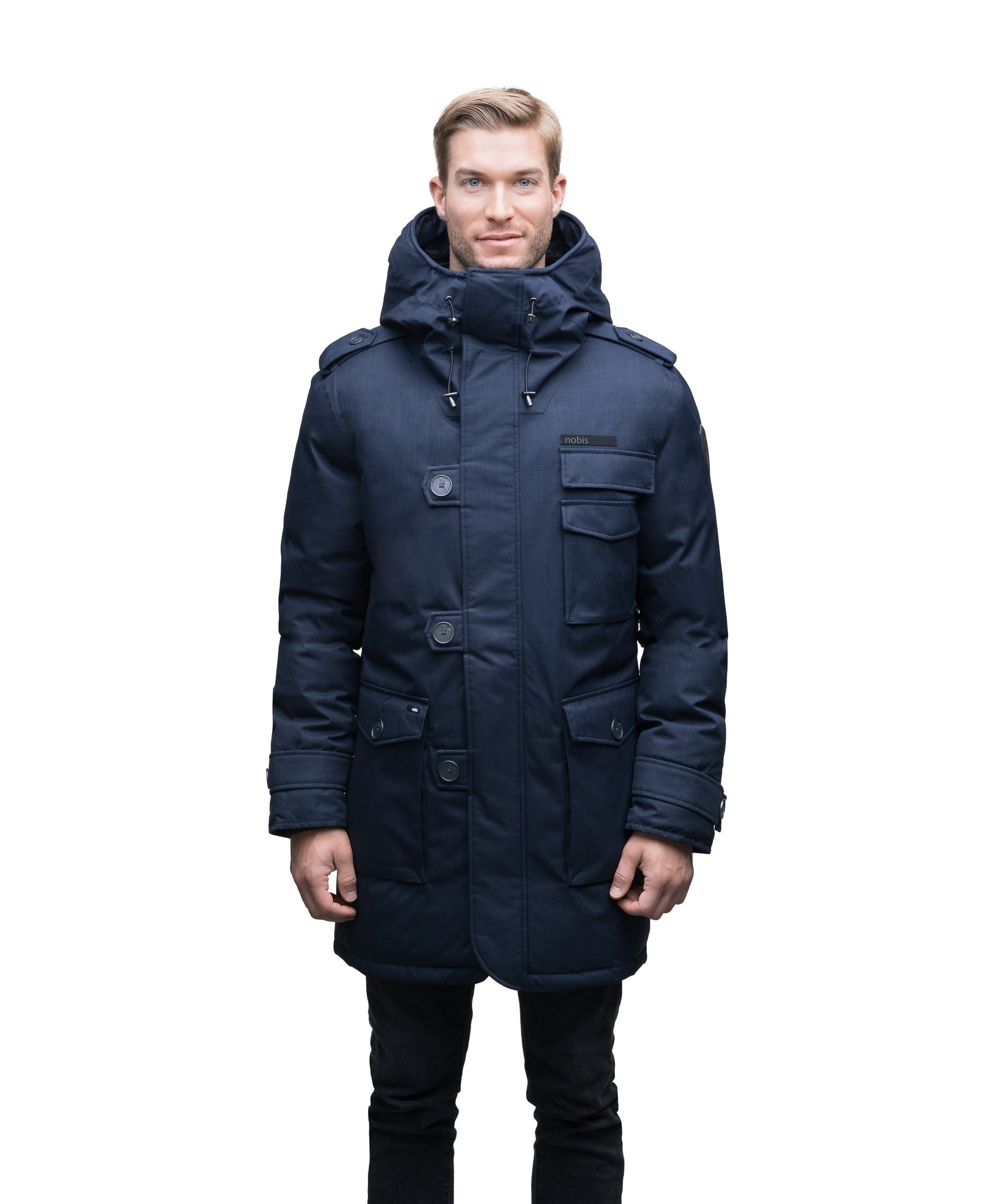 Men's down filled parka with faux button magnet closures and fur free hood with a fishtail hemline in CH Navy