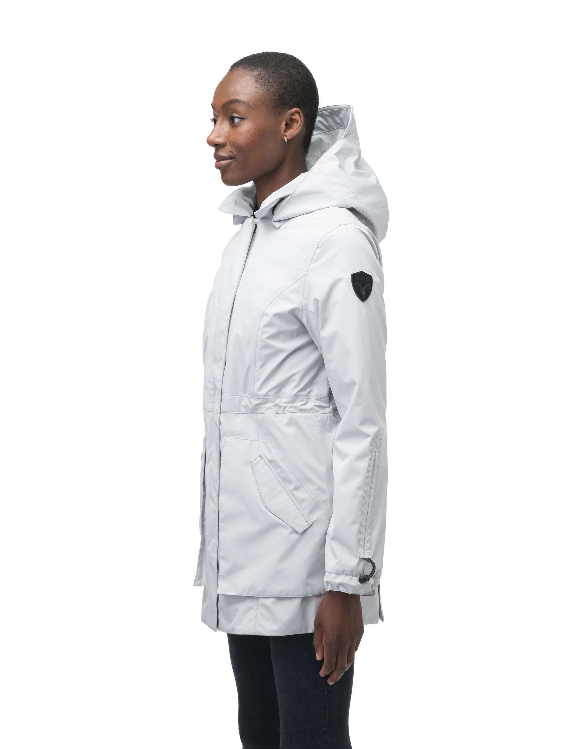 Women's thigh length raincoat with collar and non-removable hood in Light Grey