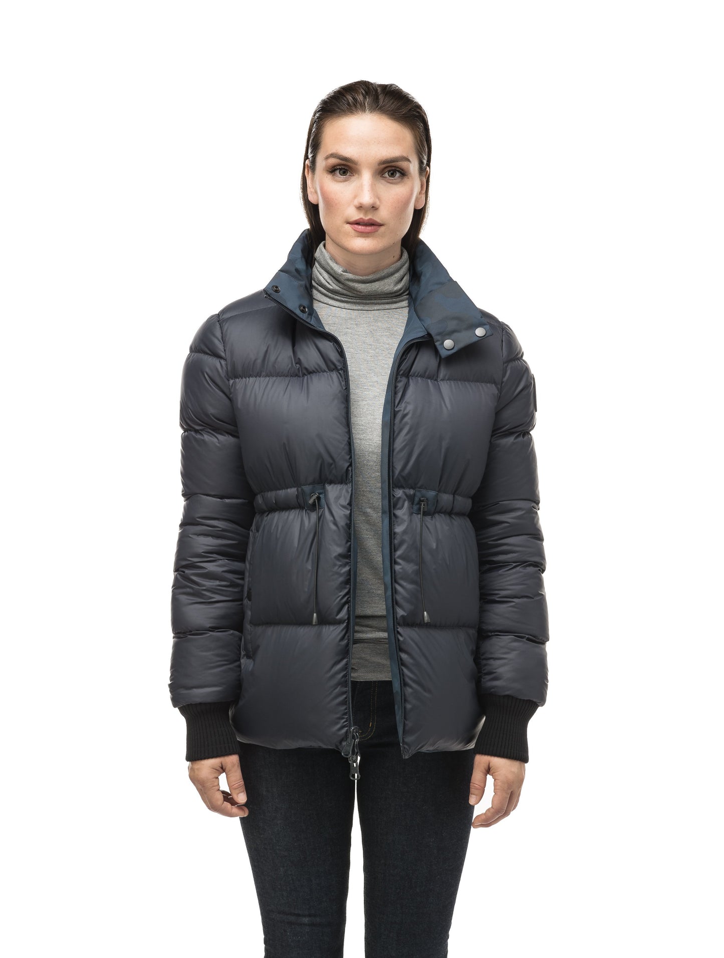 Hip length, reversible women's down filled jacket with waterproof exposed zipper in Navy Camo